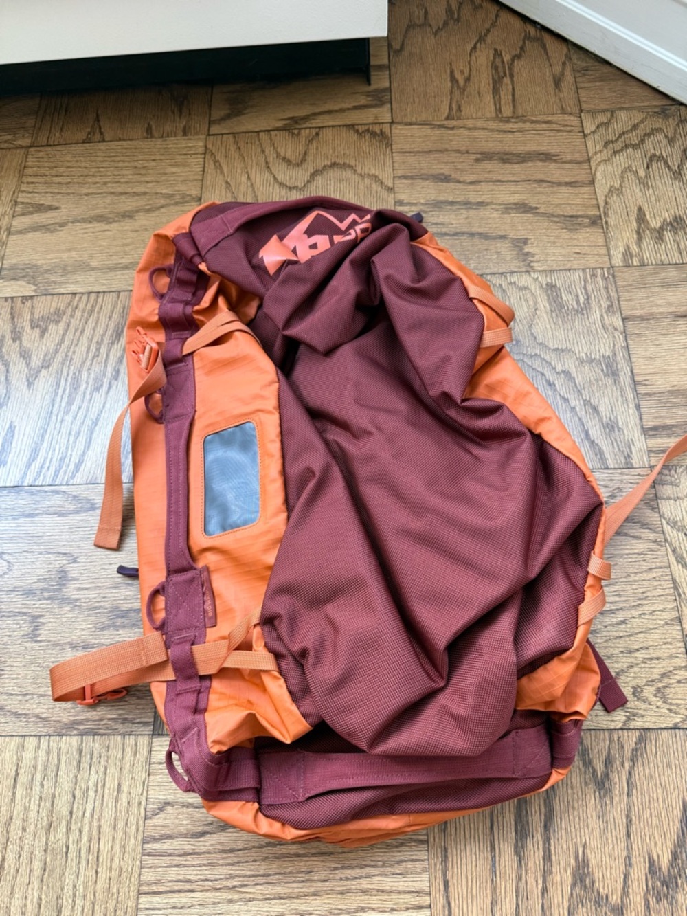 REI Co-op Travel Sling Backpack – Orange/Burgundy
